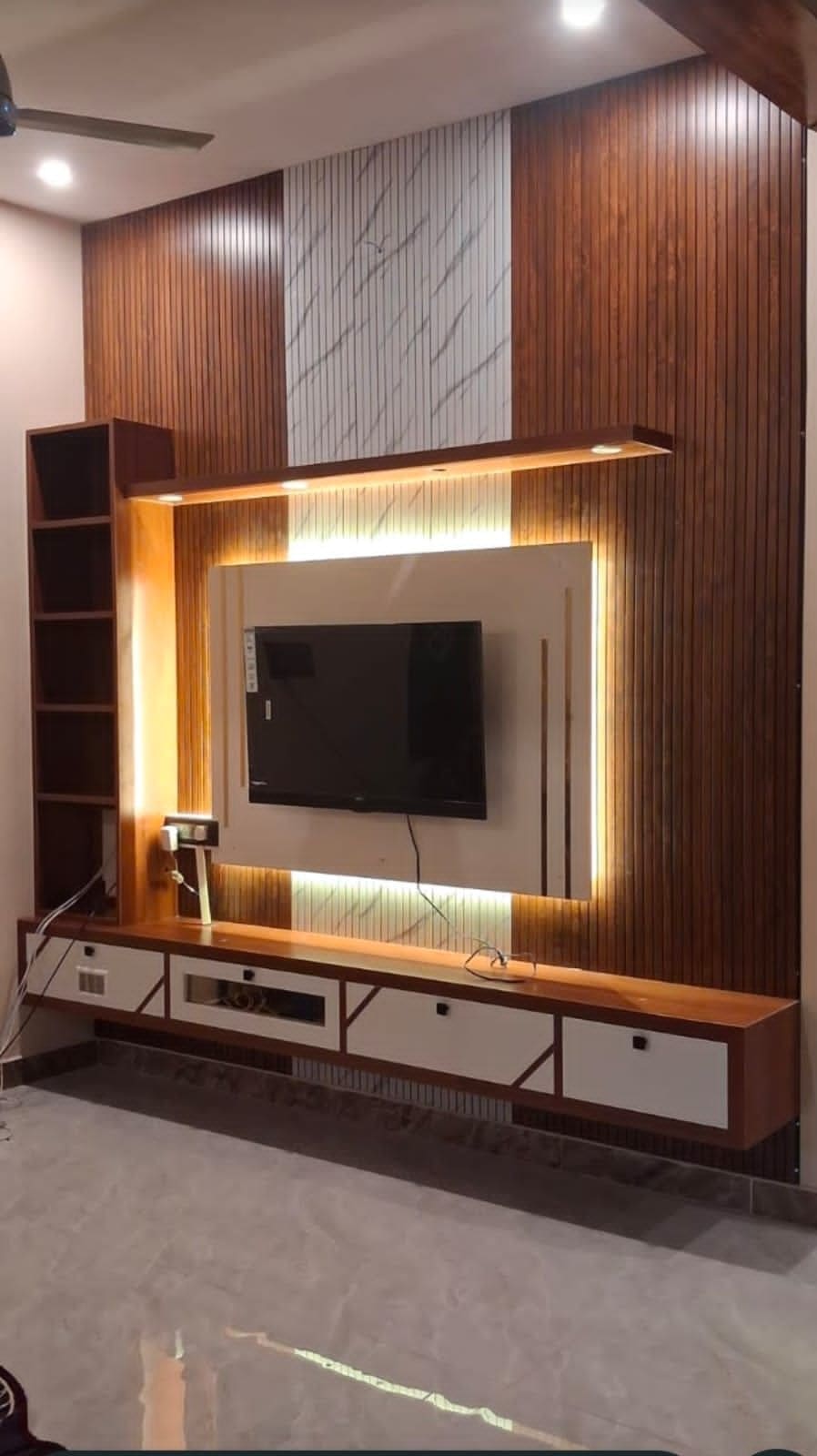 Backlit TV unit with wood and marble-look panels