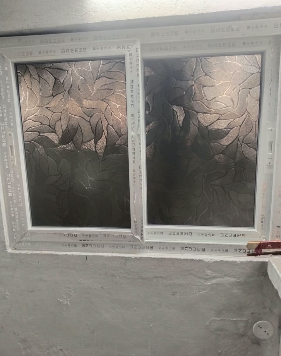 UPVC sliding window — Patterned privacy glass