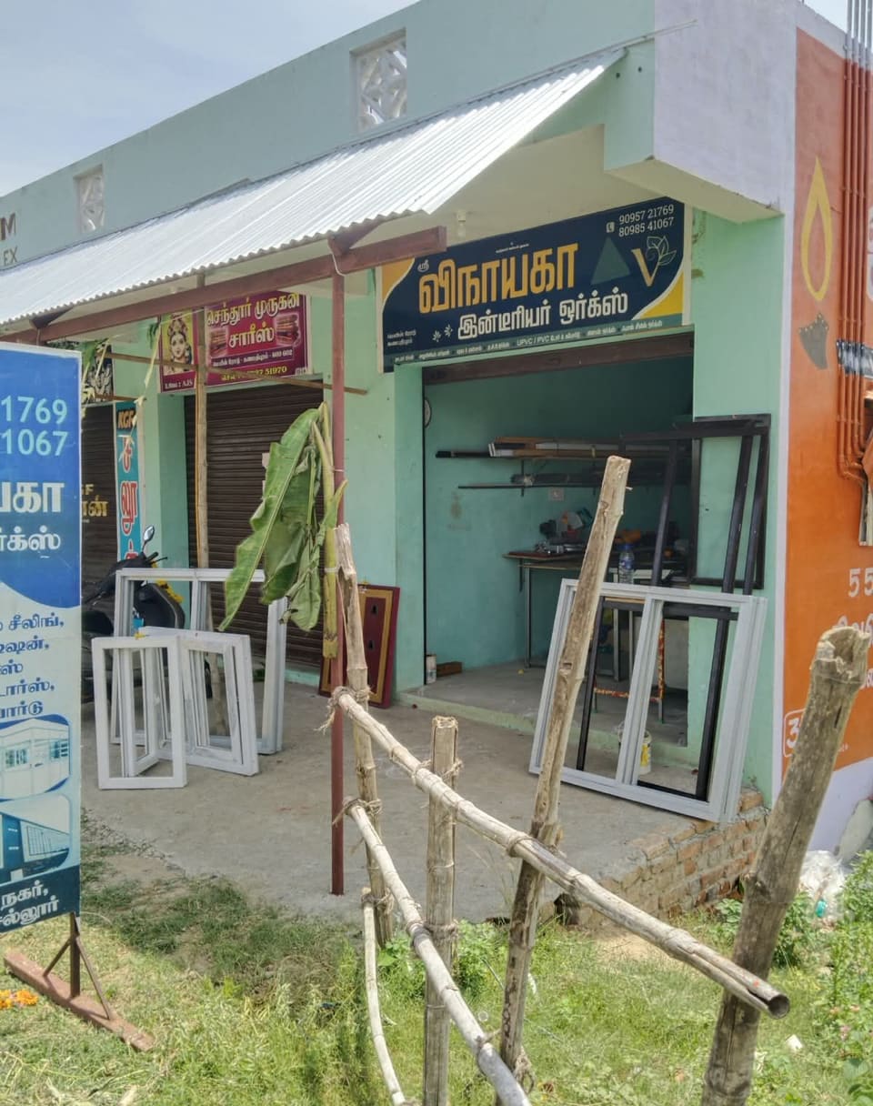 Sri Vinayaga Interior Works workshop in Sellur with UPVC frames outside